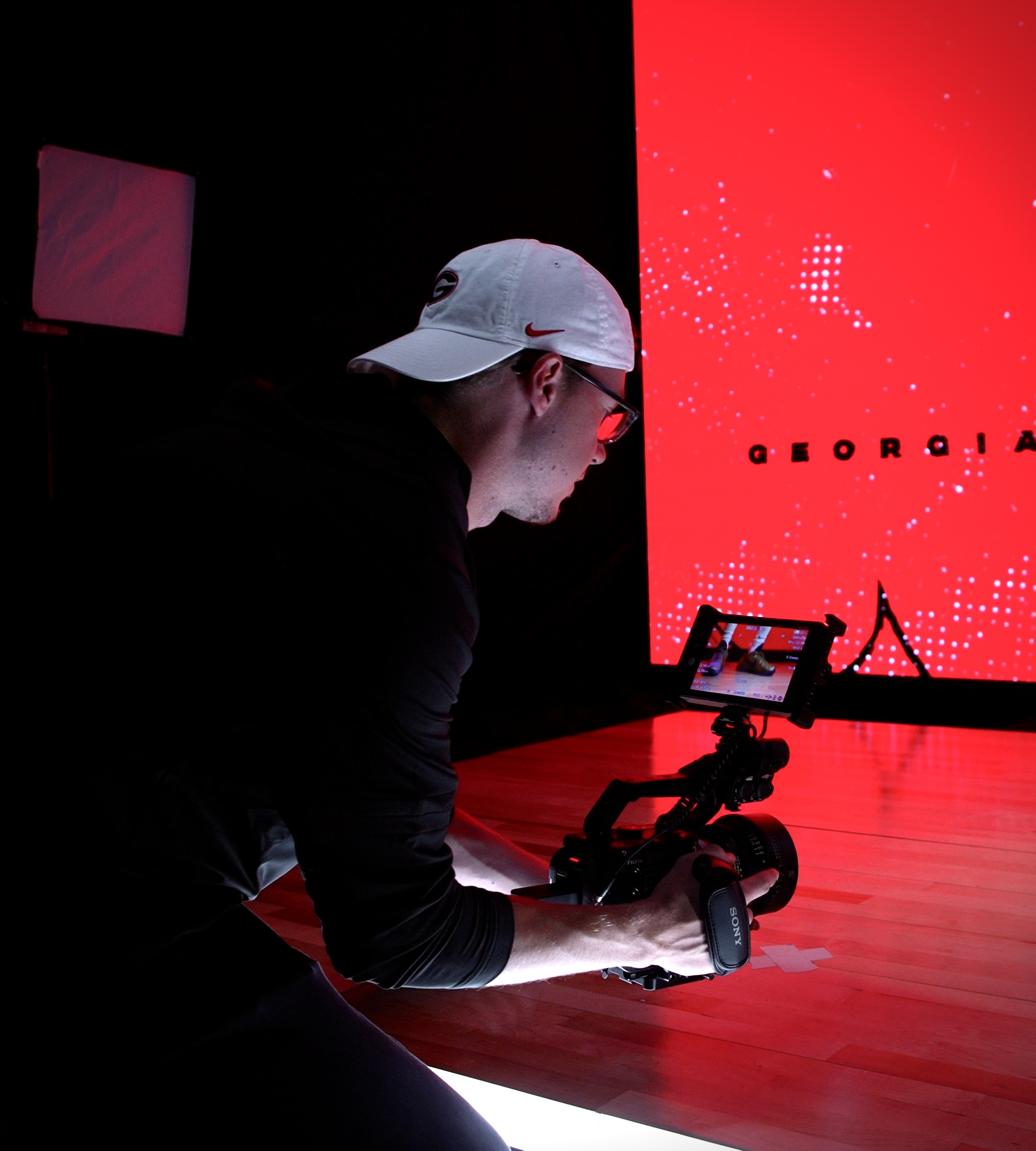 Dakota Beets working behind the camera during a Georgia Athletics production